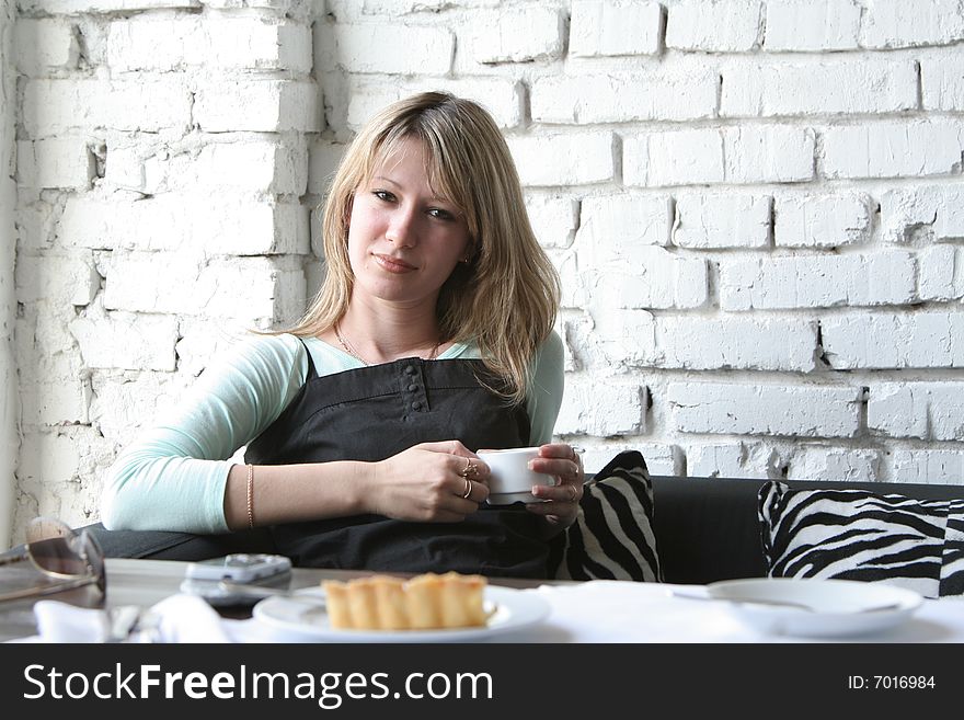 The young girl in cafe. The young girl in cafe