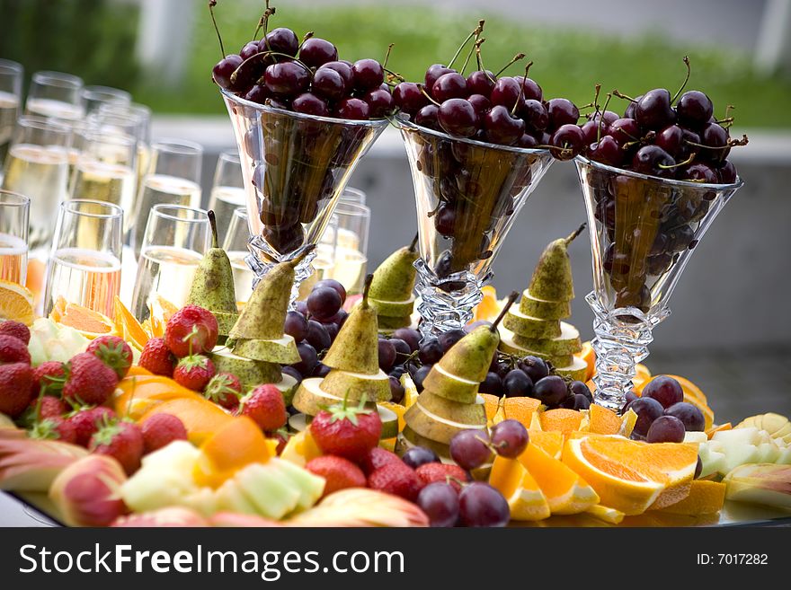 Fruit and berries in the glass in the glasses