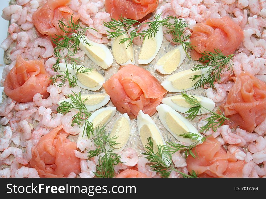 Delicious seafood gateau with smoked salmon,shrimps,tuna,egg and dill. Delicious seafood gateau with smoked salmon,shrimps,tuna,egg and dill