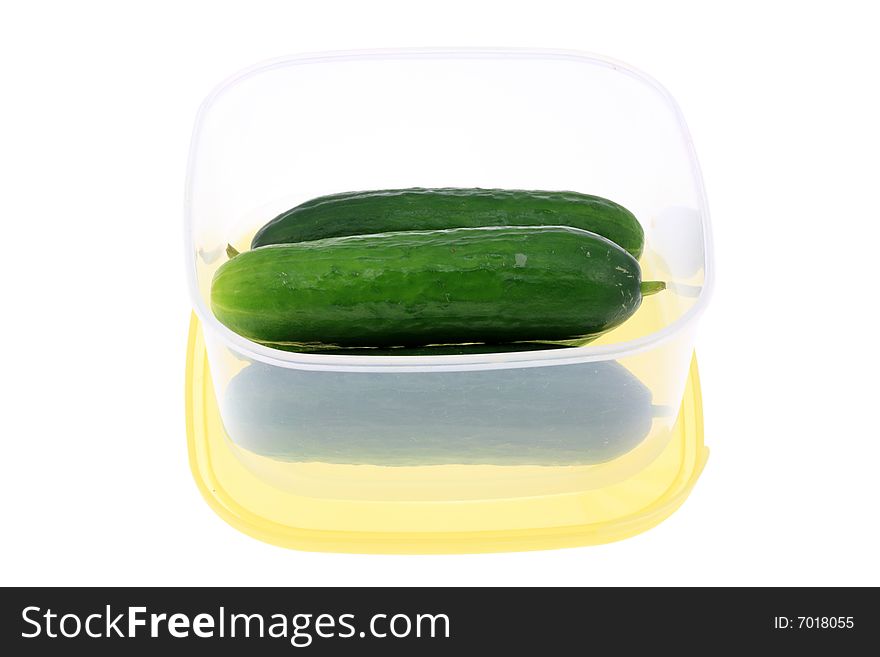 Plastic lunch box with cucumbers.