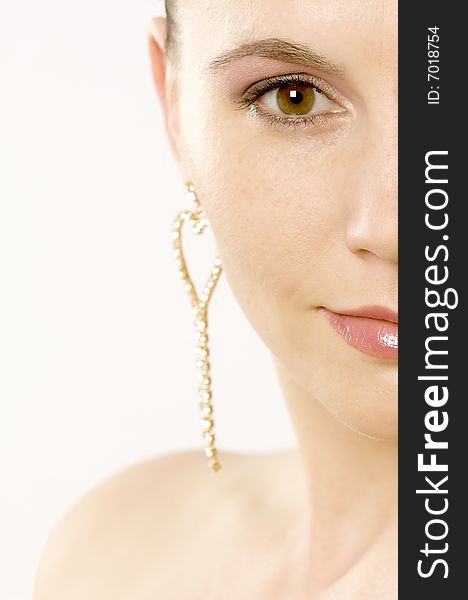 Portrait of a pretty, young woman on a white background. Portrait of a pretty, young woman on a white background.