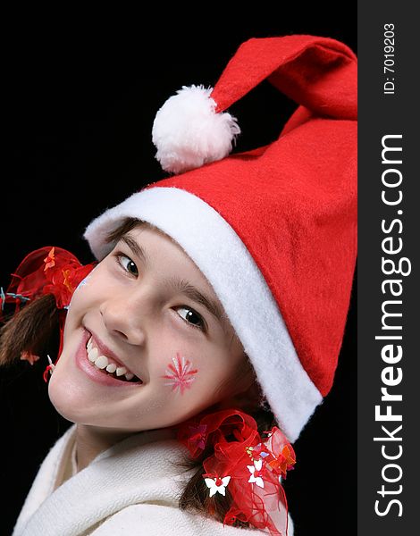 Smiling girl with Christmas cap. Smiling girl with Christmas cap