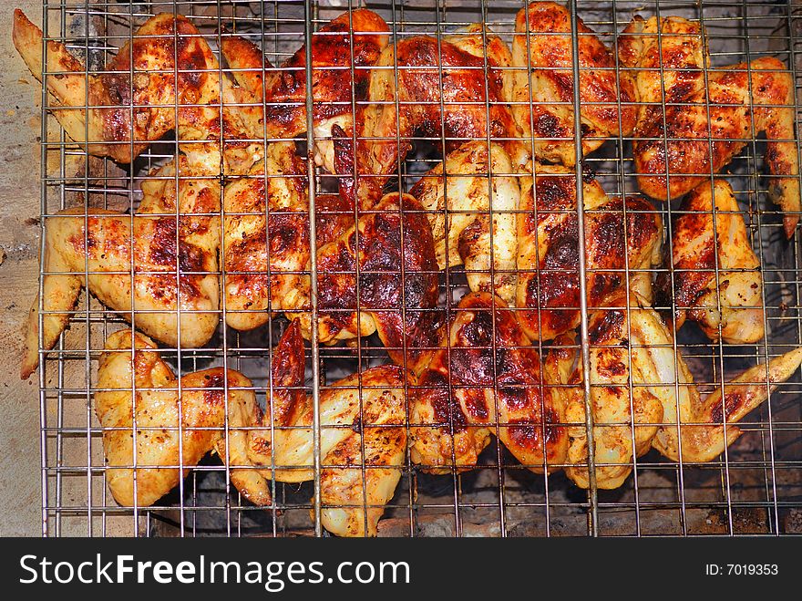 Chicken wings, baked in barbecue