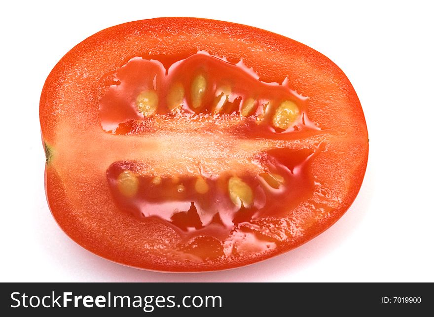 Cut cherry tomato close up.