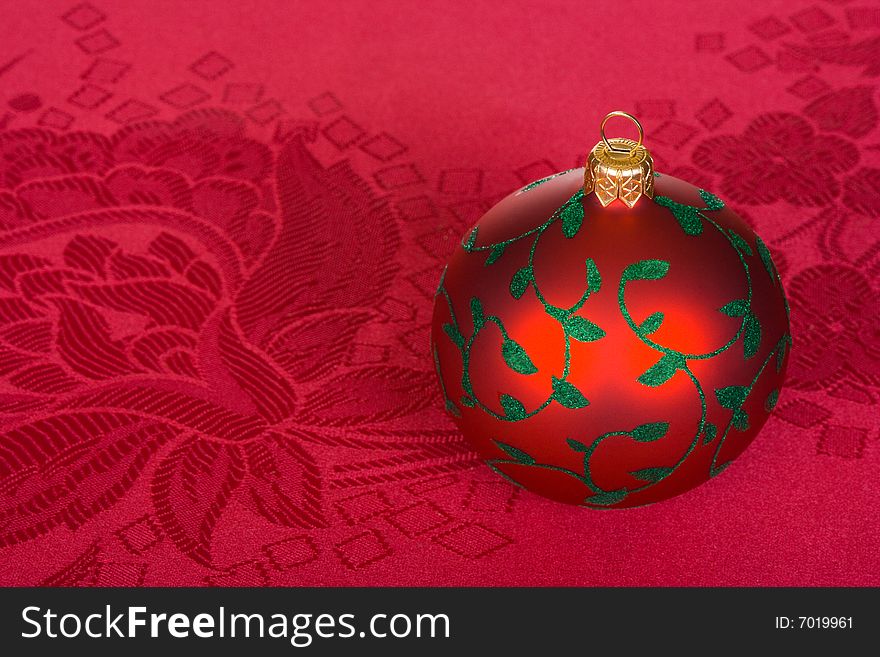 Red christmas ball, holiday background