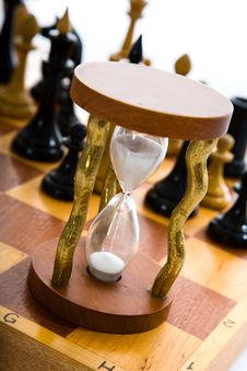 Chess Composition With Hourglass Stock Images