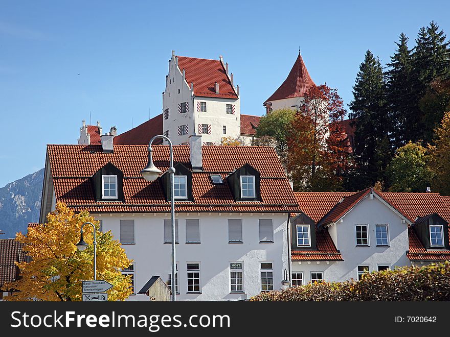 German castle in bright autumn sunlight