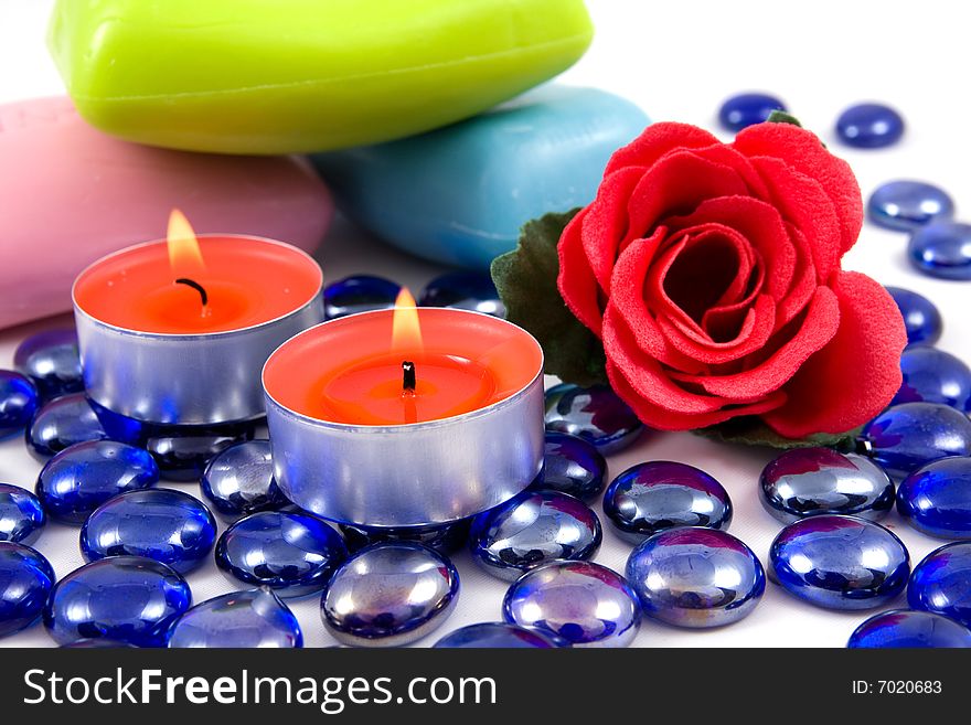 Colourful soap bars and aroma rose  on a white background. Colourful soap bars and aroma rose  on a white background