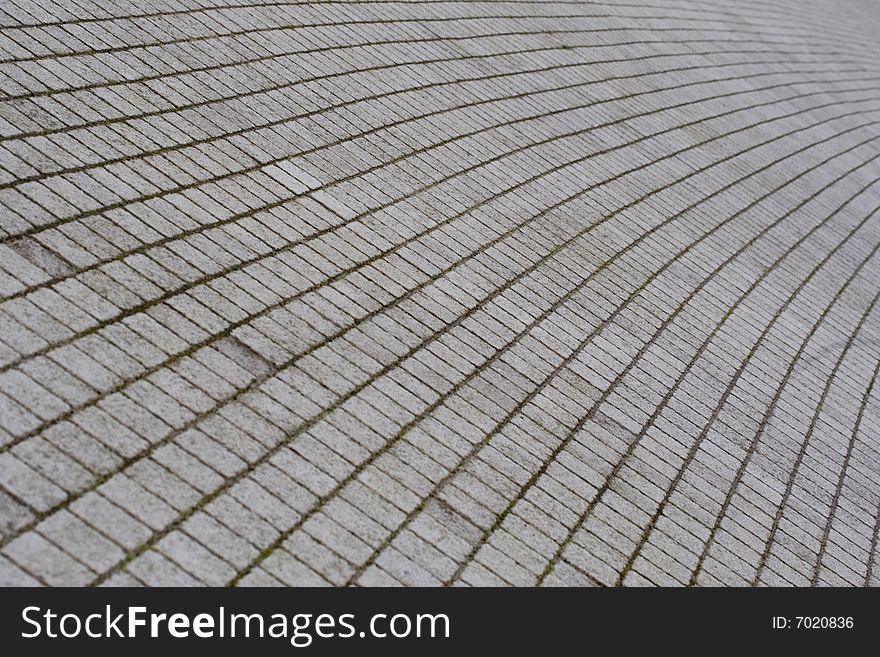 Cobble paved walkway, stretching to the distance. Ideal for a background or design work. Cobble paved walkway, stretching to the distance. Ideal for a background or design work.