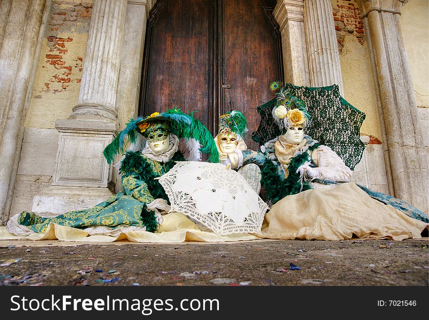 Three beautiful  masks in Venice, Italy. Three beautiful  masks in Venice, Italy.