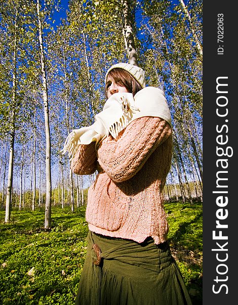 Young woman ready for a cold day in the forest. Young woman ready for a cold day in the forest
