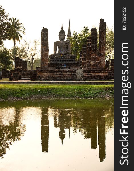 Buddha Statue in Wat Mahathat Temple in Sukhothai Historical park at sunset, Thailand,. Buddha Statue in Wat Mahathat Temple in Sukhothai Historical park at sunset, Thailand,