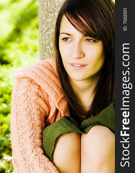 Young beautiful woman posing in a forest. Young beautiful woman posing in a forest.