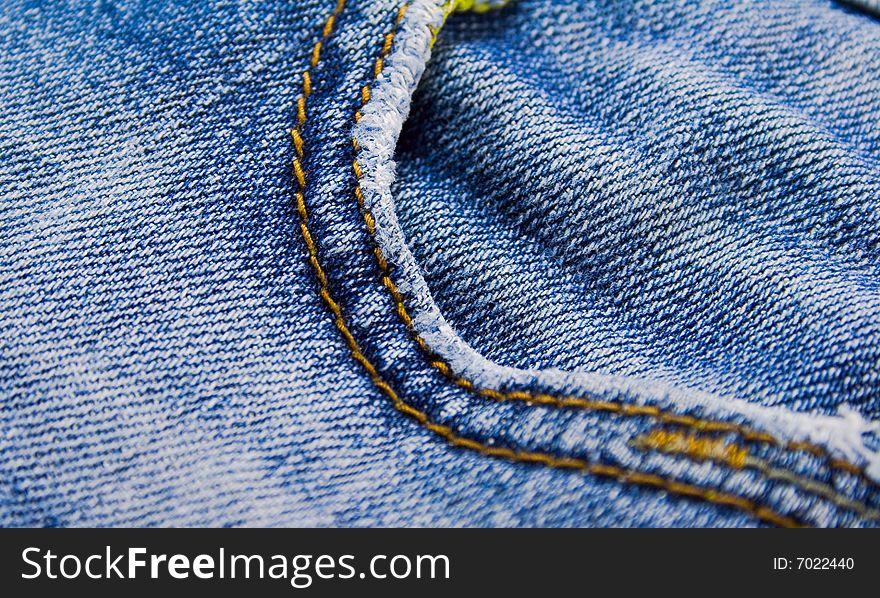 Blue jeans pocket close up