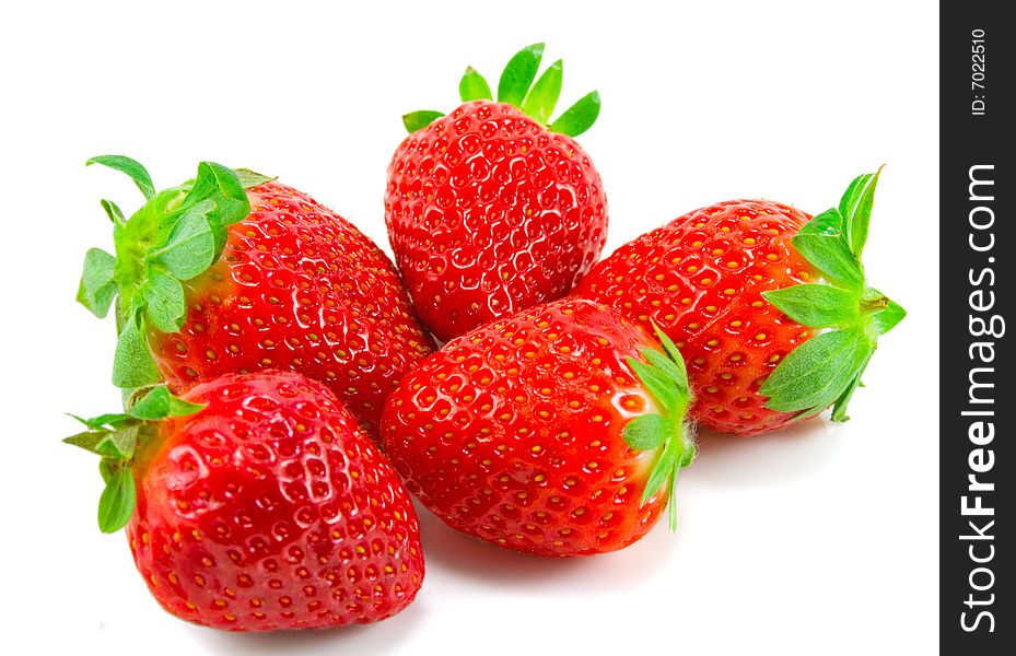 Five strawberries on white background