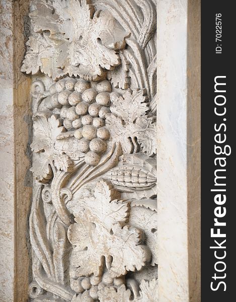 Fragment of a stone carving at doors of the Isakievsky cathedral in St.-Petersburg Russia