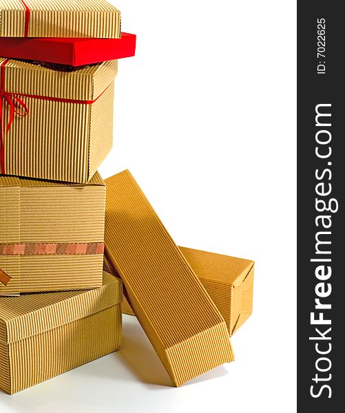 Stack of cardboard boxes close up on white background