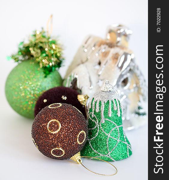 Collection of christmas tree toys on white background. Shallow depth of field