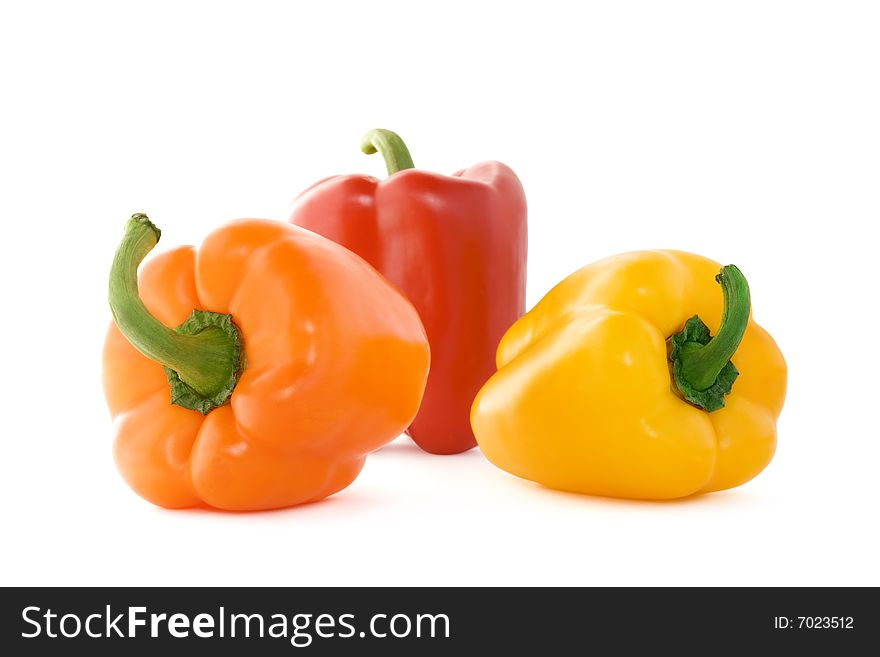 Image of an orange, yellow and red pepper isolated on a white background. Image of an orange, yellow and red pepper isolated on a white background