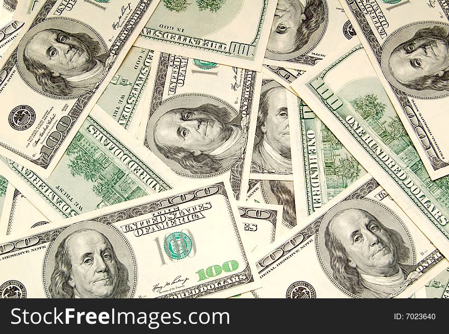 Lots of hundred dollar bills. Background image. Lots of hundred dollar bills. Background image