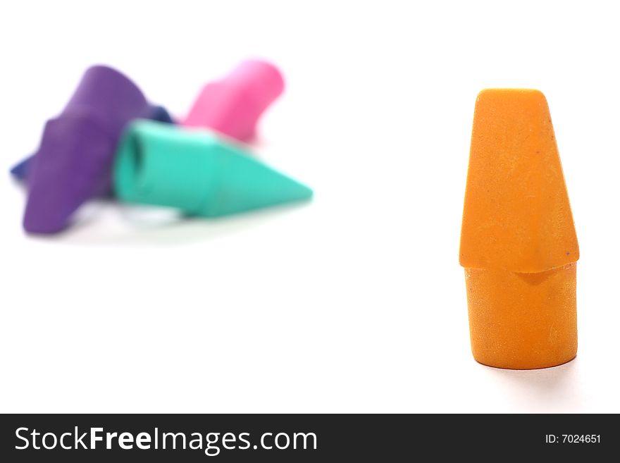 Colorful eraser tops, isolated on white background