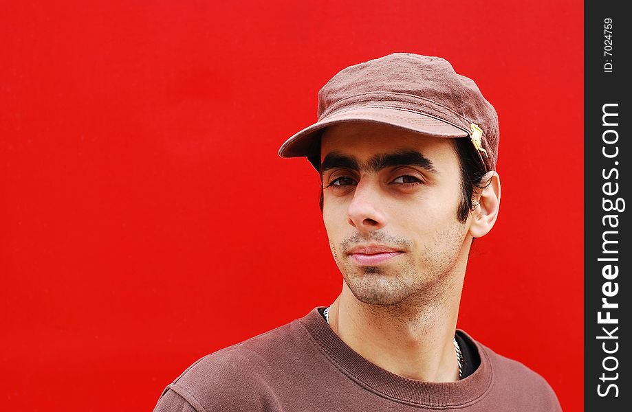 Man portrait over red background
