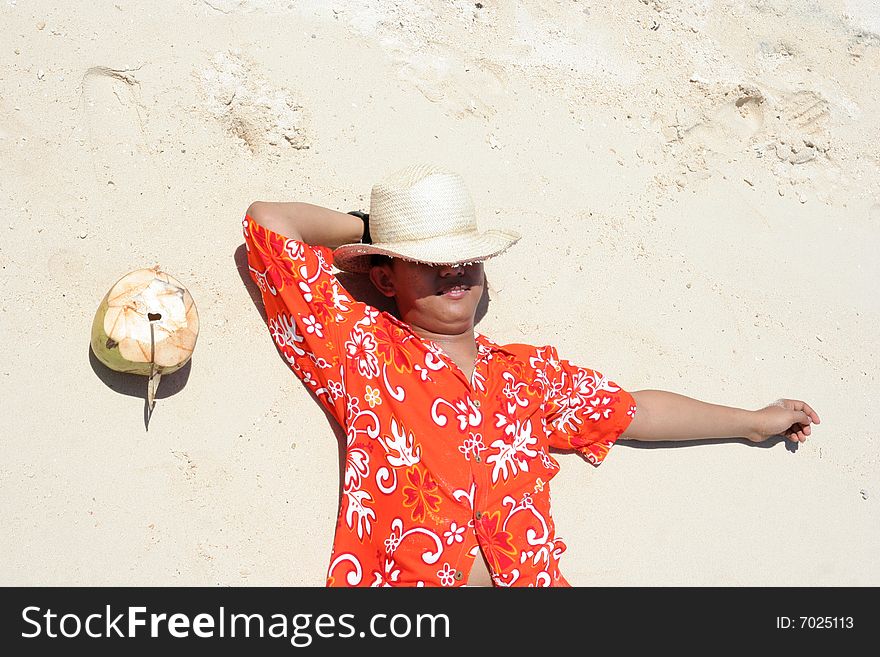 Relaxing on tropical beach sand