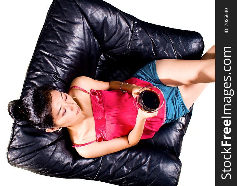 Asian female holding goblet with red wine. Asian female holding goblet with red wine