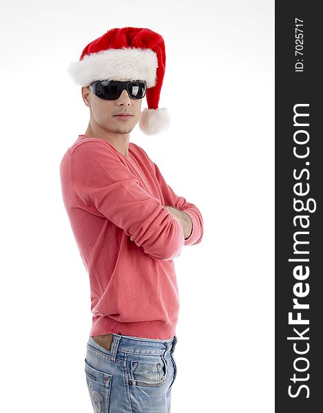 Handsome man with christmas hat against white background