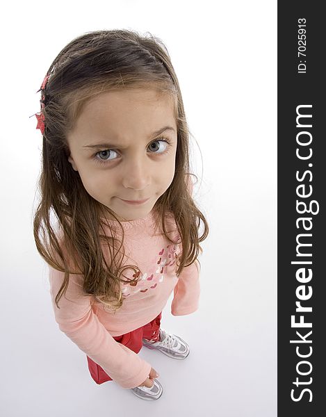 Cute girl looking upward on an isolated white background