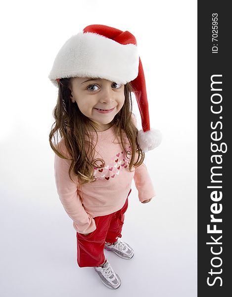 Standing little girl with christmas hat