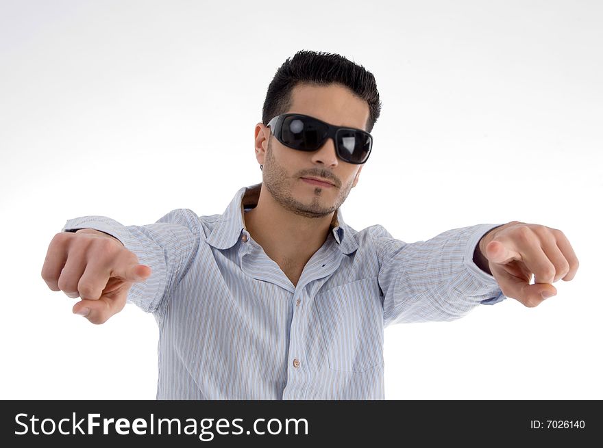 Pointing male with sunglasses against white background