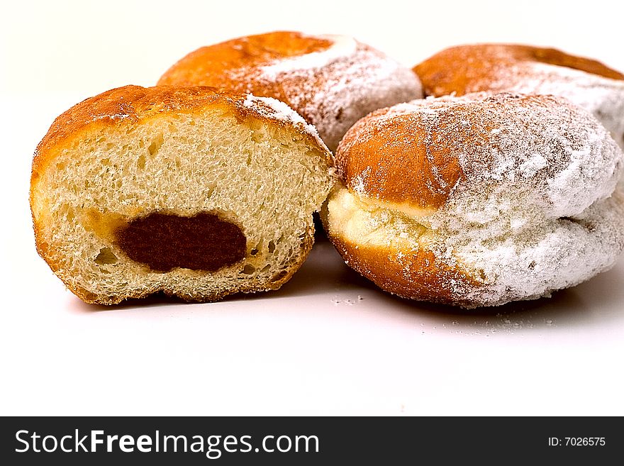 Berlin donuts with apple jam, powdered sugar on top.