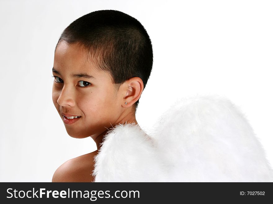 Young Asian boy with angel wings. Young Asian boy with angel wings