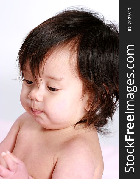 Picture of a cute Asian infant girl. Picture of a cute Asian infant girl