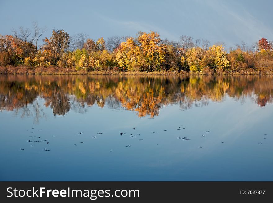 Fall Colors On A Calm Lake