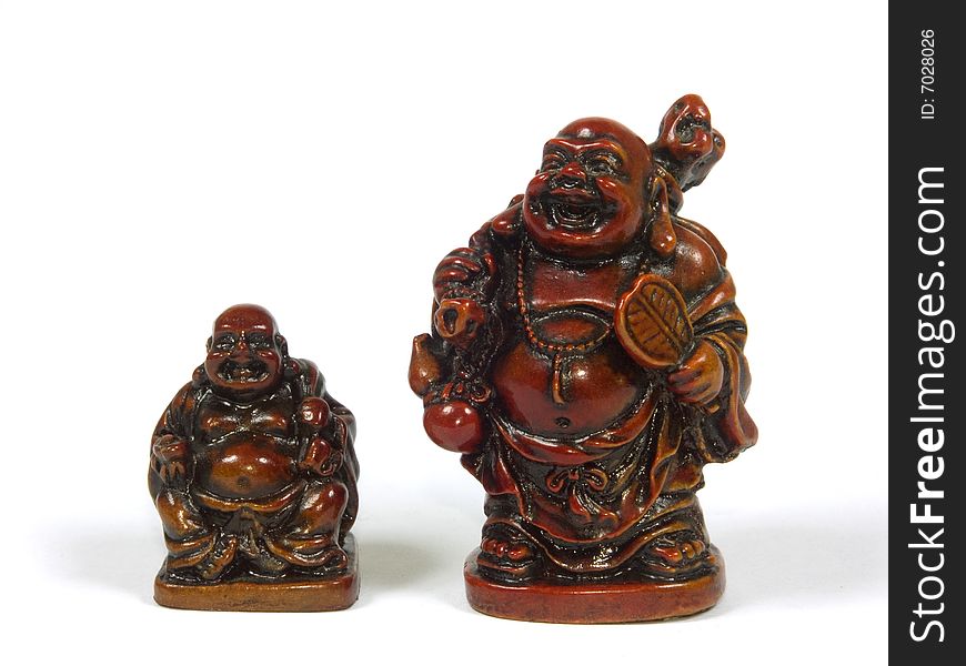 Figurines of Asian gods isolated on a white background
