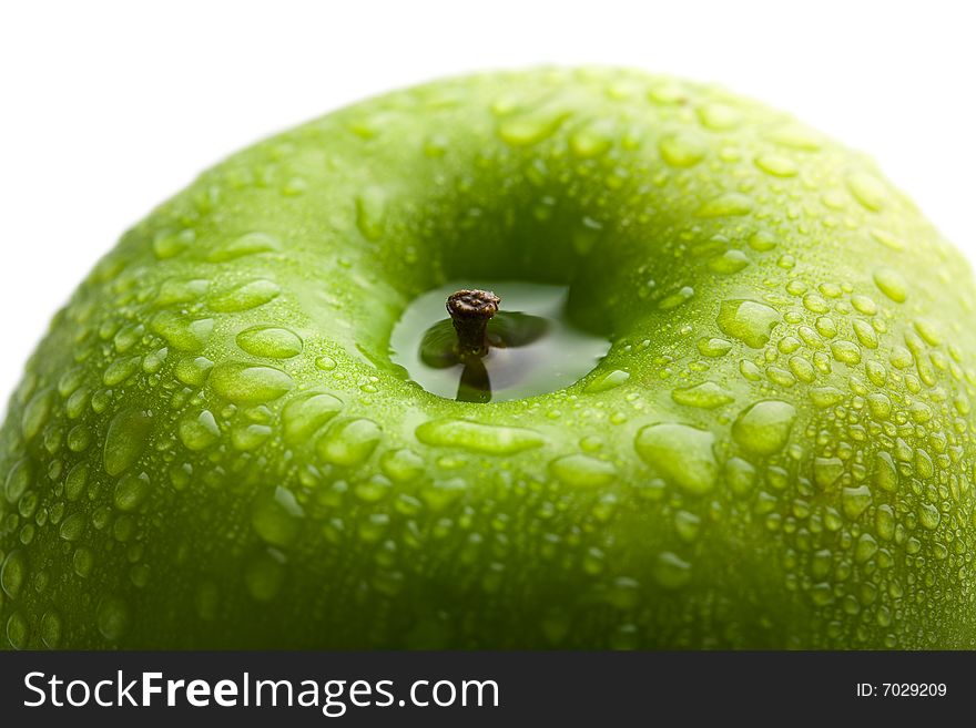 Fresh Green Apple With Water Droplets Isolated