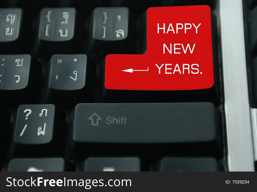 Keyboard with red key Happy New Year. Keyboard with red key Happy New Year.