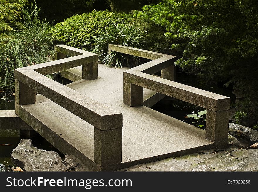 Asian style stone bridge in a garden