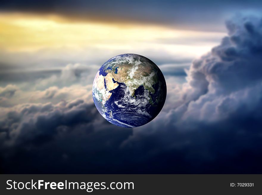 Planet earth in a cloudy sky