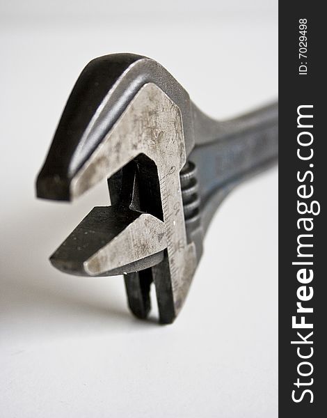 Tool : a closeup of a wrench. Tool : a closeup of a wrench