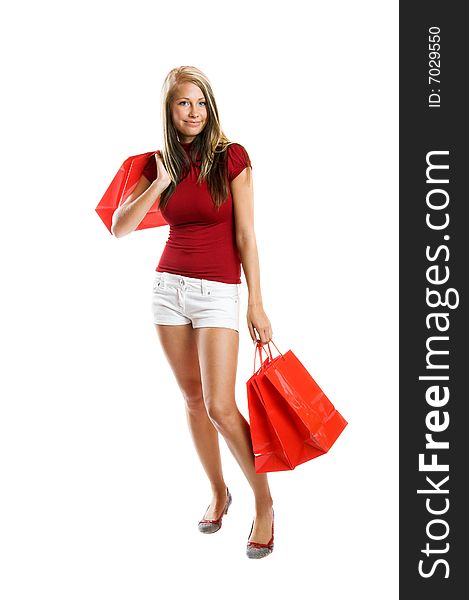 Young smiling woman with shopping bags. Young smiling woman with shopping bags