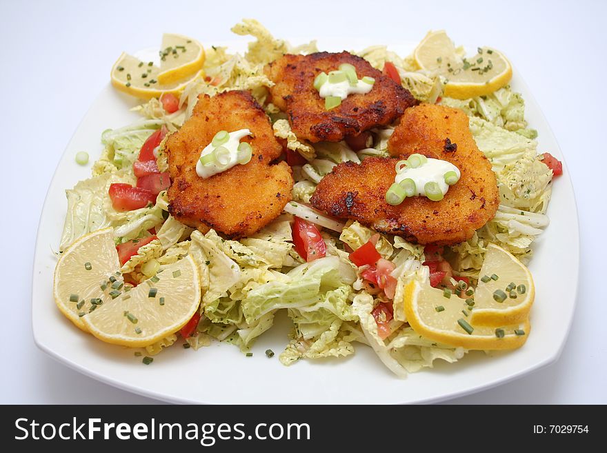 Fresh potato salad with sausage on a bowl. Fresh potato salad with sausage on a bowl