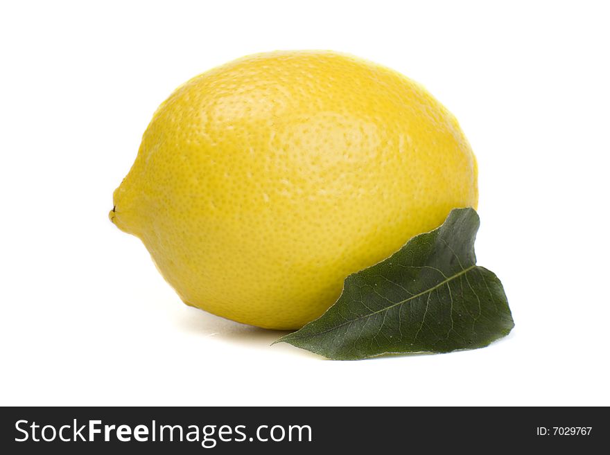 A photo of one fresh lemon