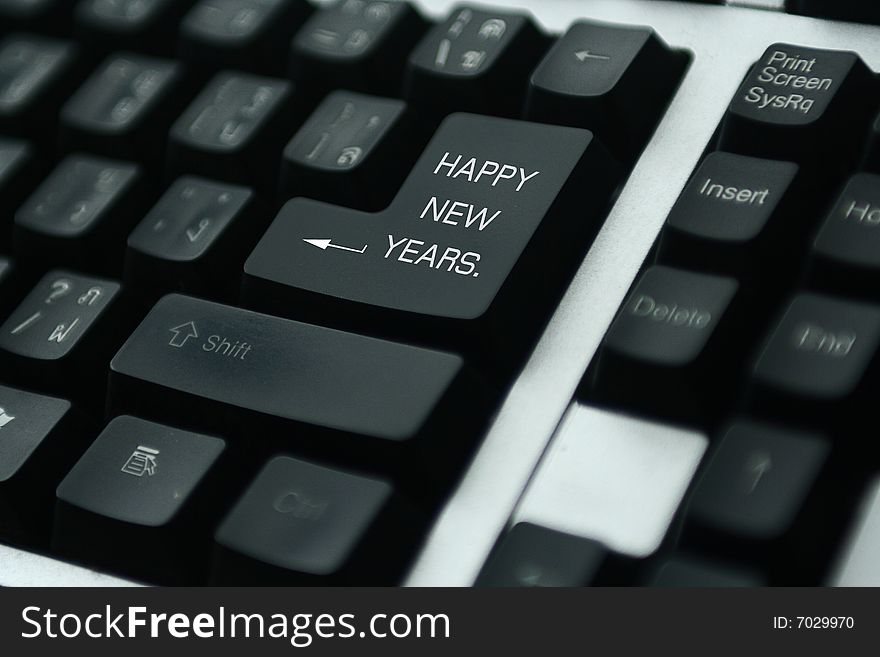 Keyboard with red key Happy New Year. Keyboard with red key Happy New Year.