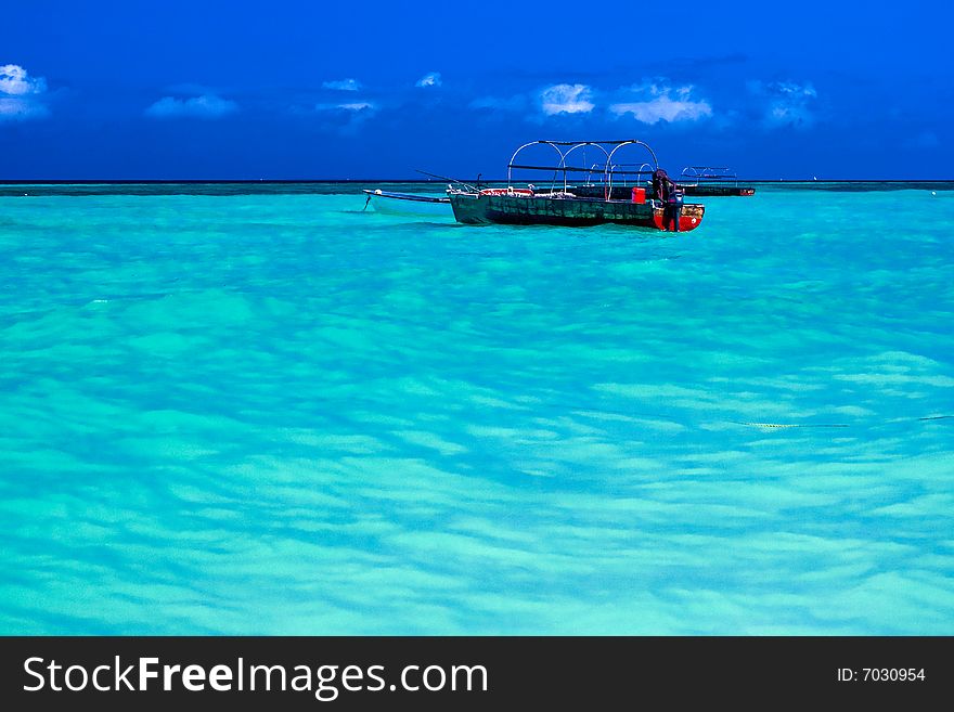 Indian Ocean with fishing boats in Zanzibar. Indian Ocean with fishing boats in Zanzibar