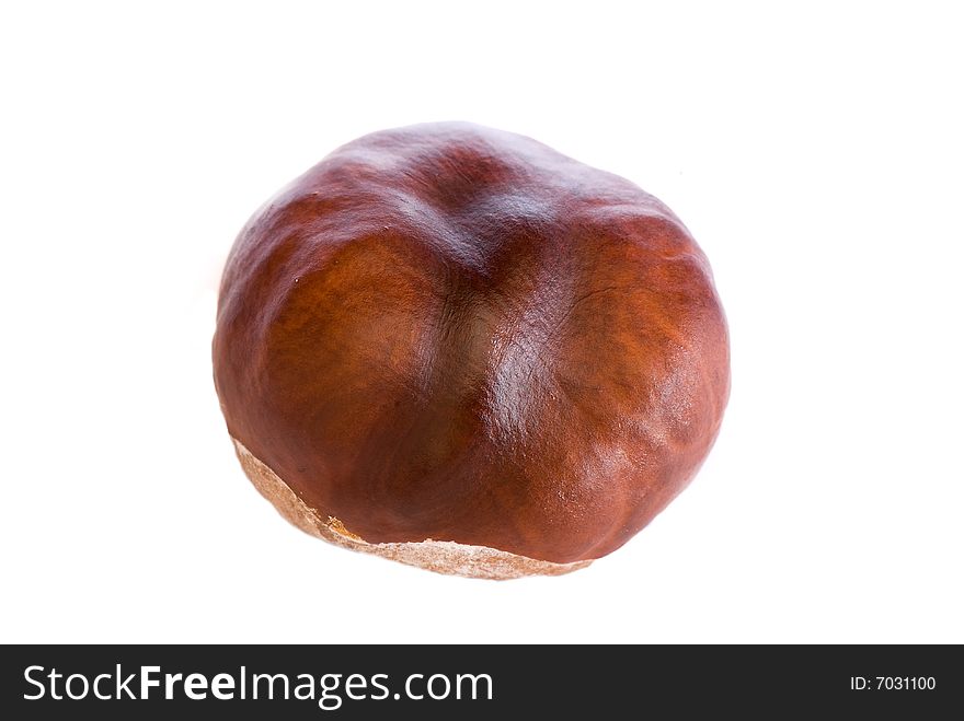 A few brown chestnuts are on a white background