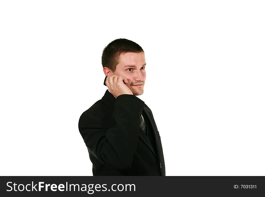 Man in suit wuth mobile on white background