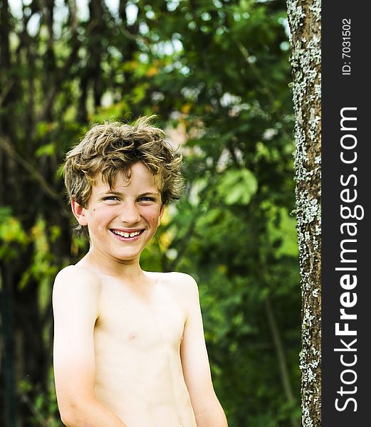 Outdoor portrait of boy laughing. Outdoor portrait of boy laughing